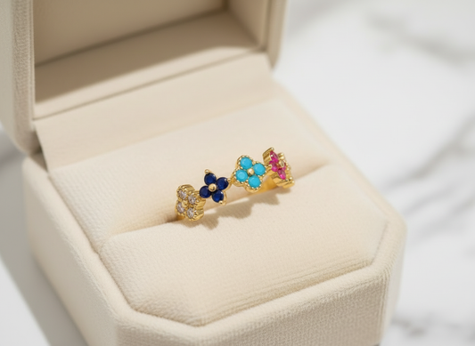 Multi-colored clover ring in cream box
